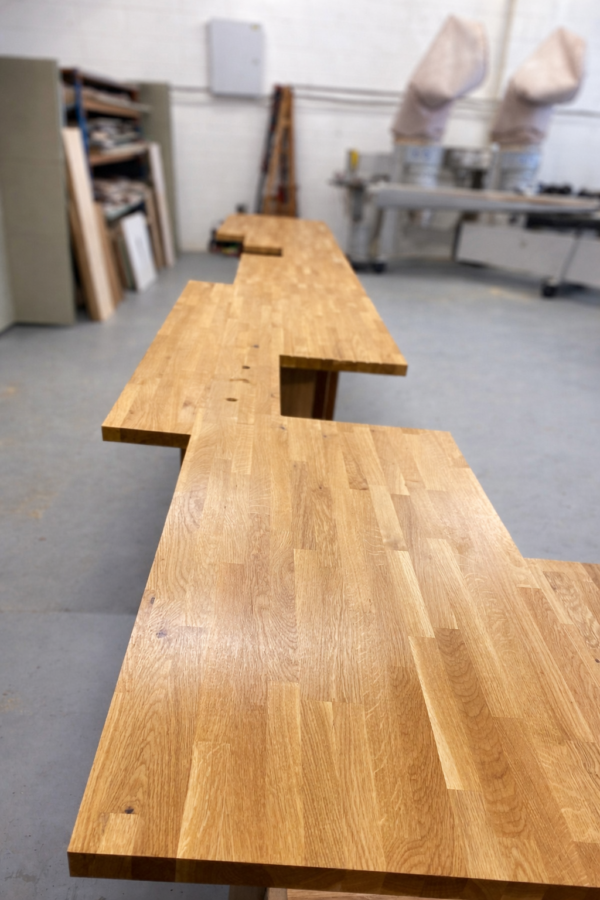 Bespoke solid oak worktops for unique long galley kitchen